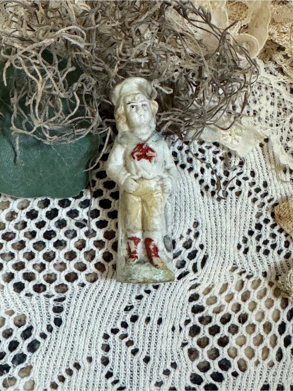 Vintage Porcelain Figurine in White and Red Accents